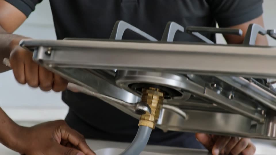 Gas Installers Eastern Cape - LPG gas hob connection being made by a registered gas installer